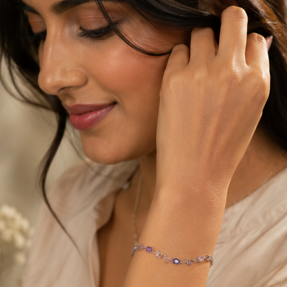 Woman wearing a bracelet with a blurred background